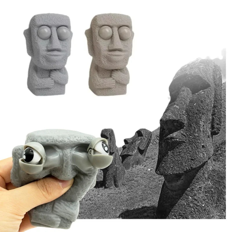 Stone man releases stress toy slowly rebounds soft Moai statue squeeze eyes interested expression relaxes stress children's gift